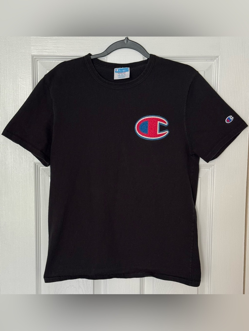 Champion Black Tee with Red & Blue Logo Patch